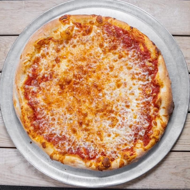 A classic cheese pizza from Genova's Italian Restaurant & Pizza, with melted mozzarella and red sauce.